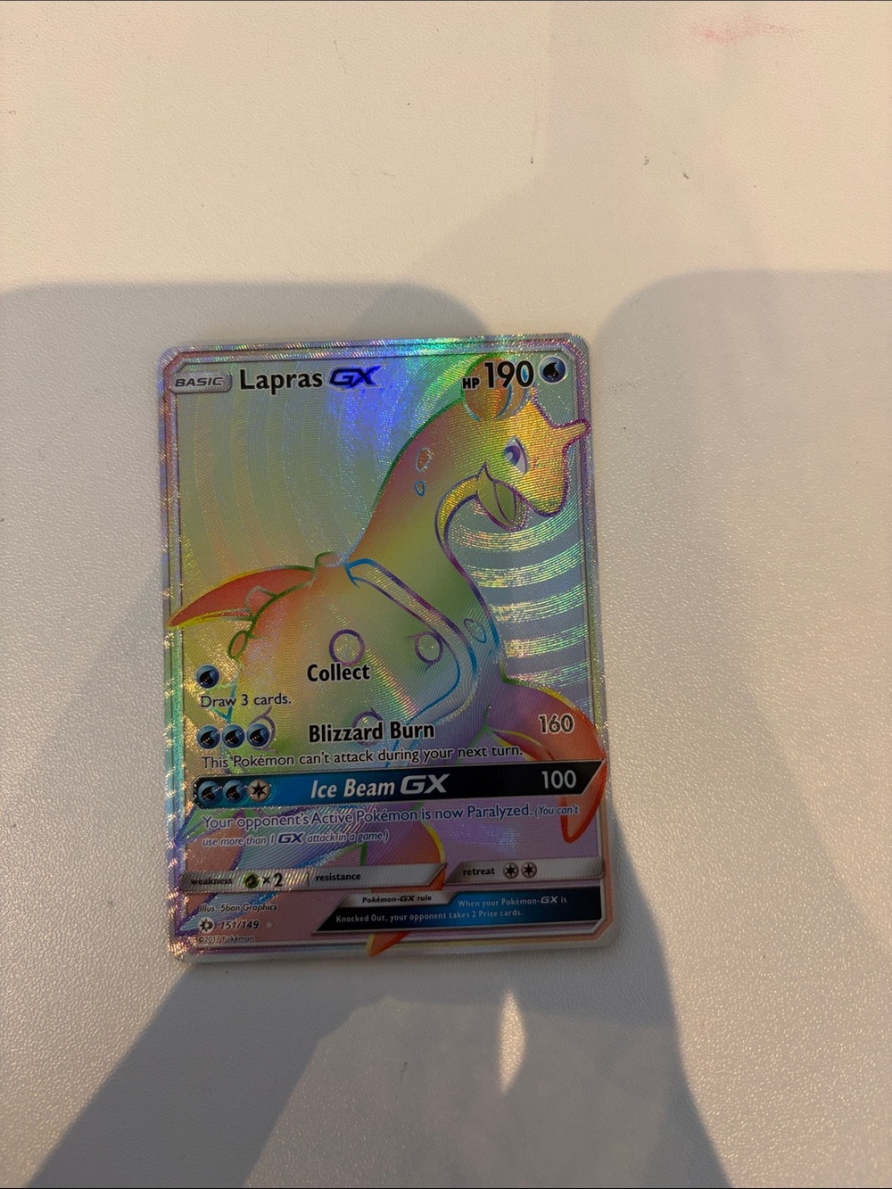 Lapras GX Holographic Trading Card - Blue/Purple pokemon